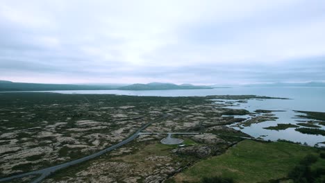 aerial of thingvellir mountains with river and roads, iceland