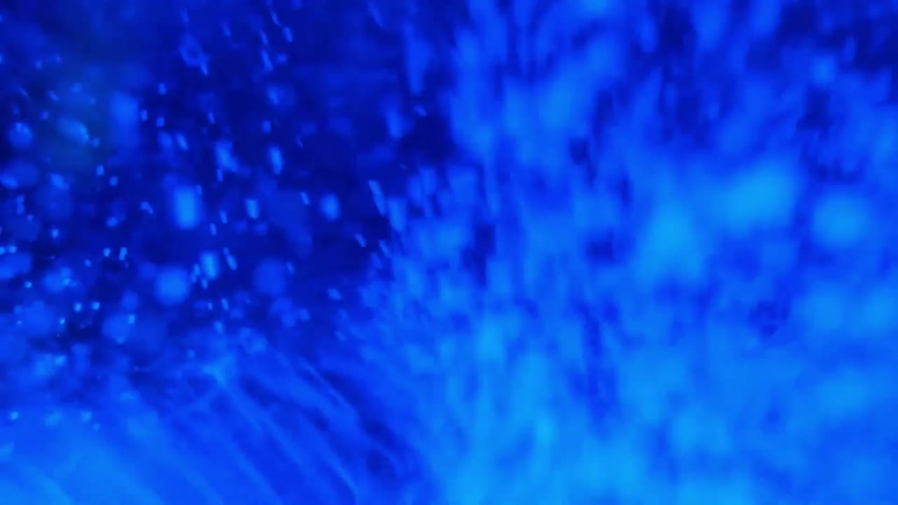 Background animation of a turbulent blue liquid with bubbles and swirling flows.