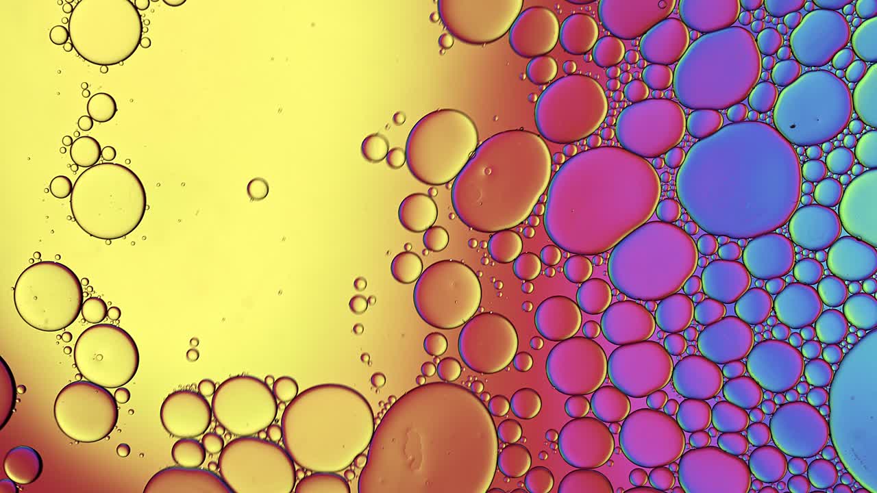 Abstract Colorful Food Oil Drops Bubbles and spheres Flowing
