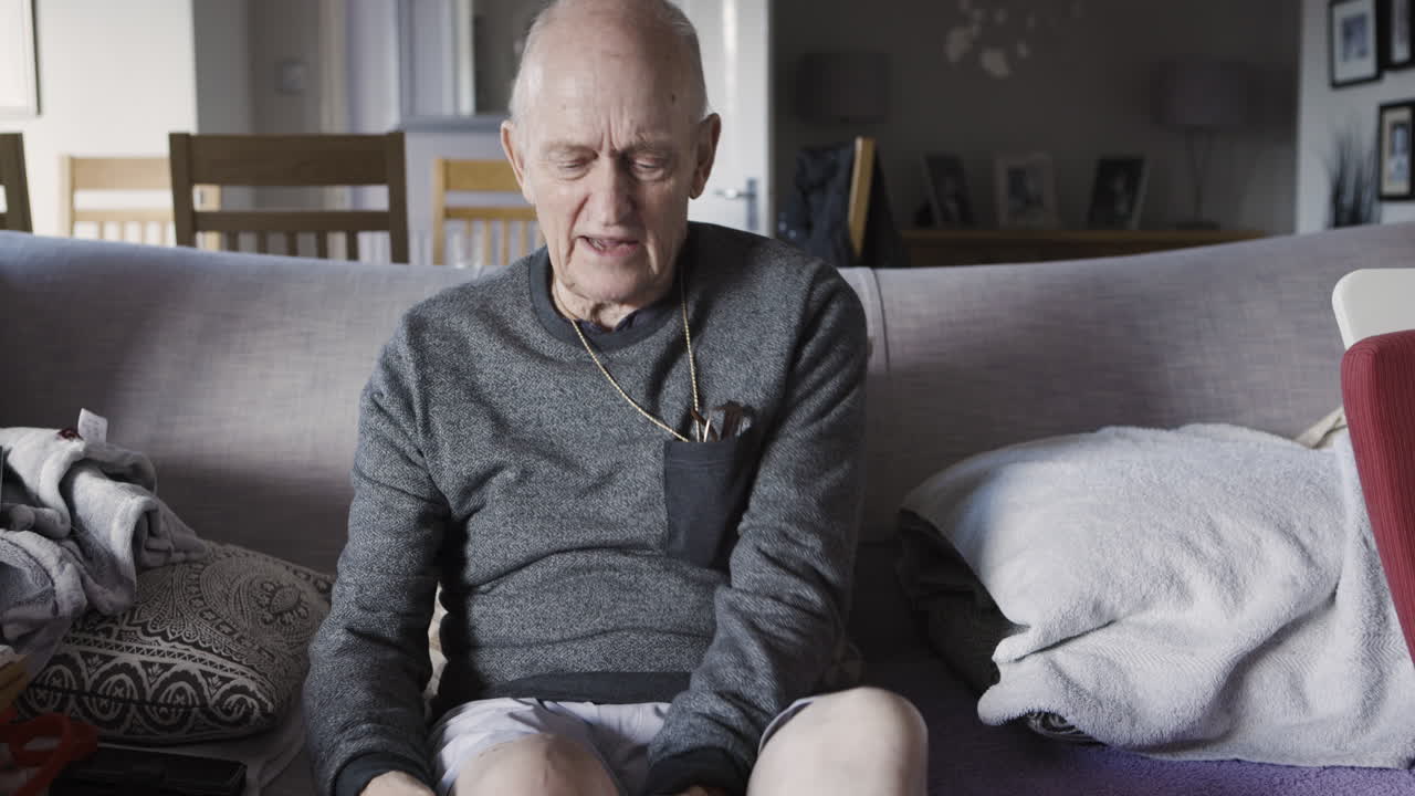 Senior man sitting on a couch