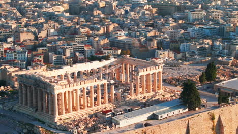 tight circling aerial shot of the parthenon undergoing repairs athens