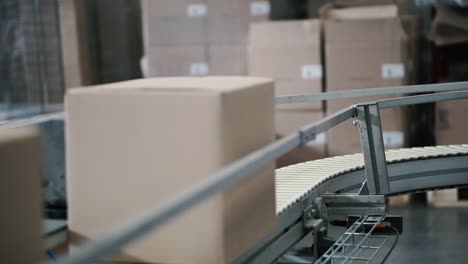 boxes on conveyor belt in a warehouse