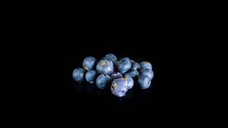 Blueberries-Dehydrating-In-The-Studio---Plain-Black-Background---timelapse