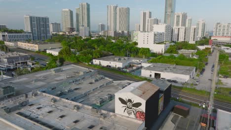 aerial view of town development. tilt up reveal of modern high rise office or apartment buildings. miami, usa