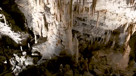 postojna caves interior pan over stalagmites stalactites