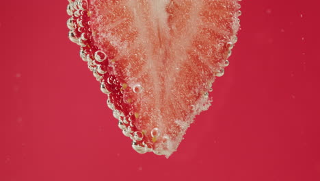 strawberry slice in sparkling water