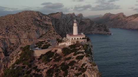 sunrise drone shot over the lighthouse of cap formentor, mallorca