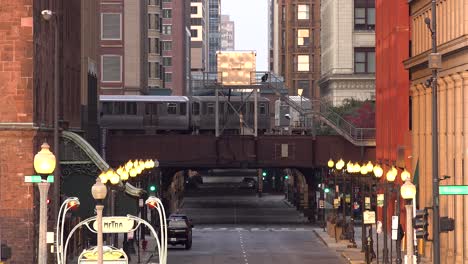 train passing by city buildings