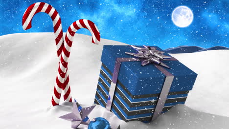 animación de nieve cayendo sobre el regalo de navidad y dulces por la noche