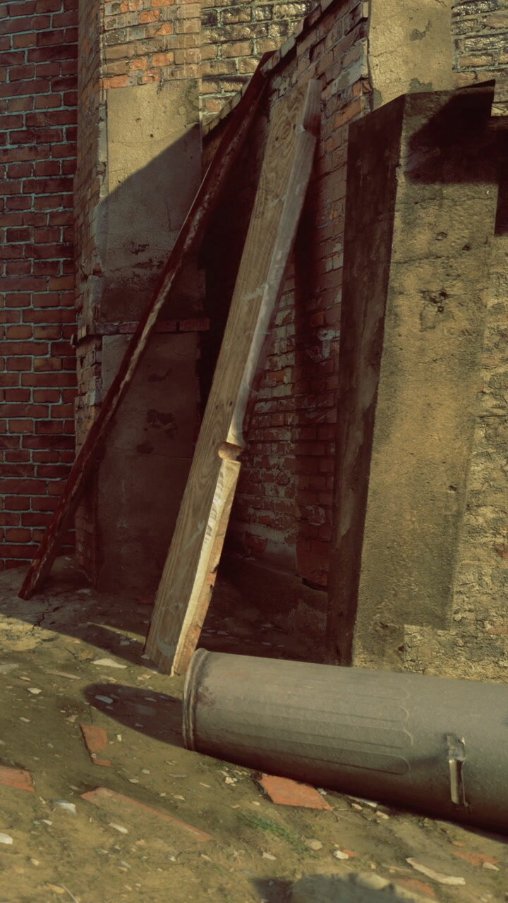 Urban scene with a bin and brick wall during daylight hours