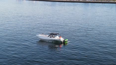 Tourist-On-Speed-Boat-At-Serene-Seascape-On-Summer-Sunset