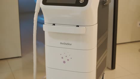 modern laser hair removal machine in the cosmetology clinic