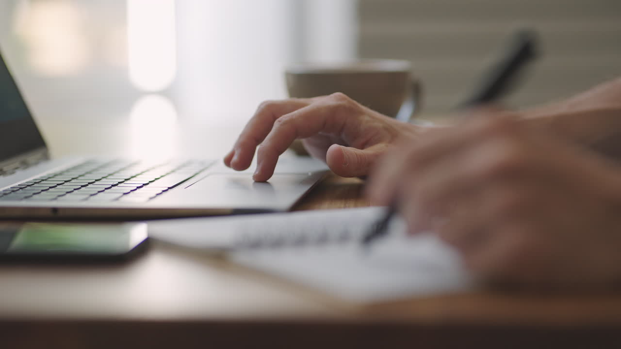 Hispanic latin man college student using laptop computer watching distance online learning seminar class remote university webinar or having virtual classroom meeting in university creative space.