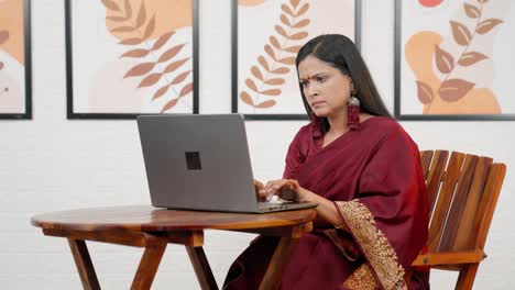 indian woman working on laptop