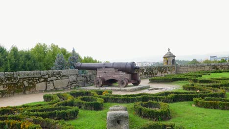 pan across large cannons protecting castle parapet battlement lawn in chaves vila real portugal