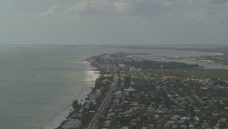 fort myers beach florida aerial v4 dramatic high angle pullout of the shoreline community - dji inspire 2, x7, 6k - march 2020
