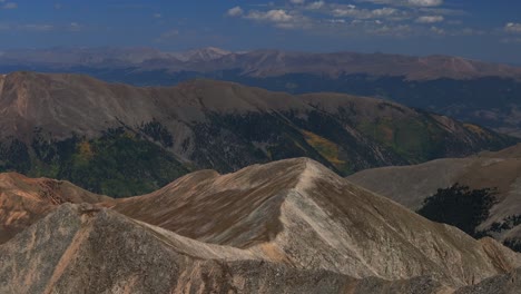 huron peak summit 14er hike climb summer fall autumn rocky mountains colorado aerial drone collegiate peaks three apostles la plata switchback trail buena vista sunny blue sky parallax forward pan up