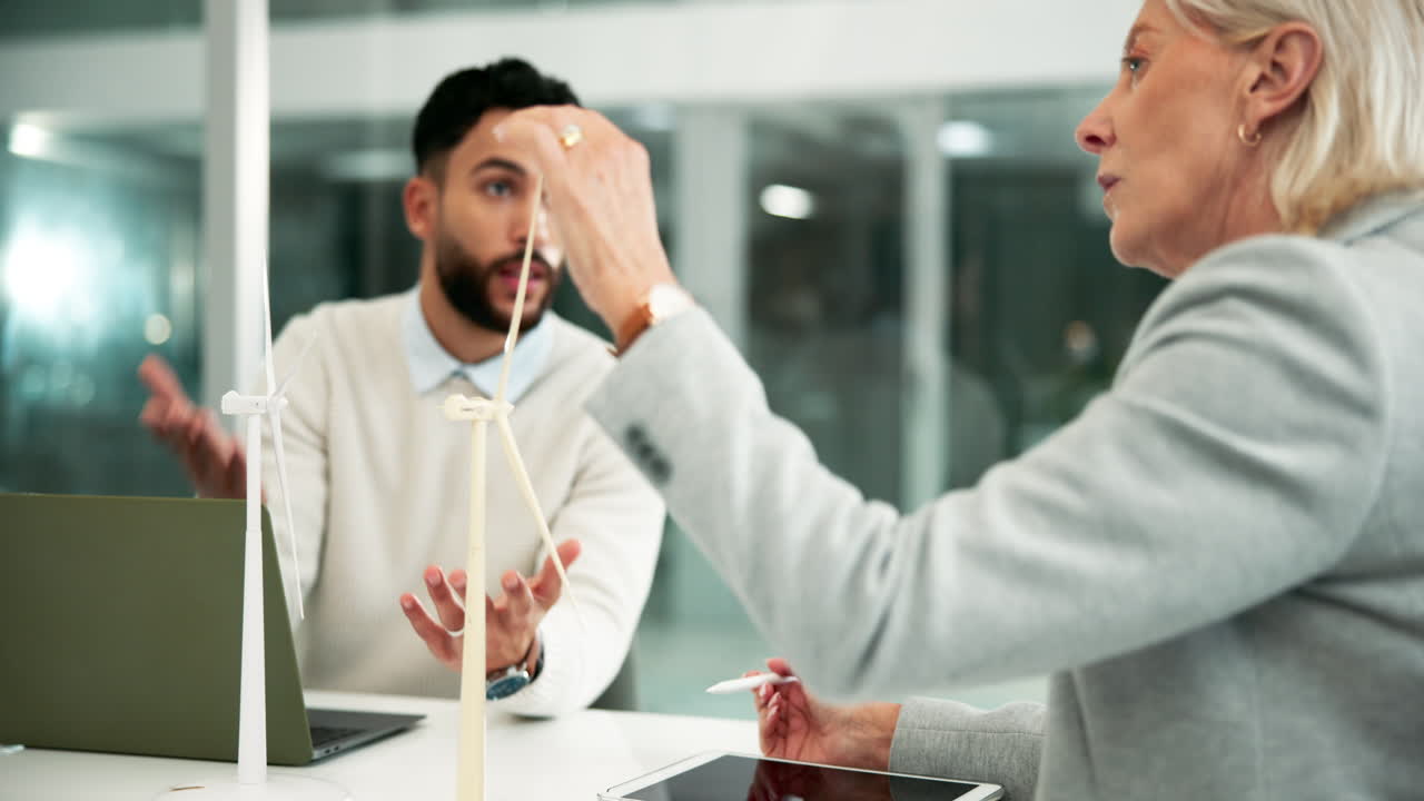 Business meeting discussing sustainable energy solutions