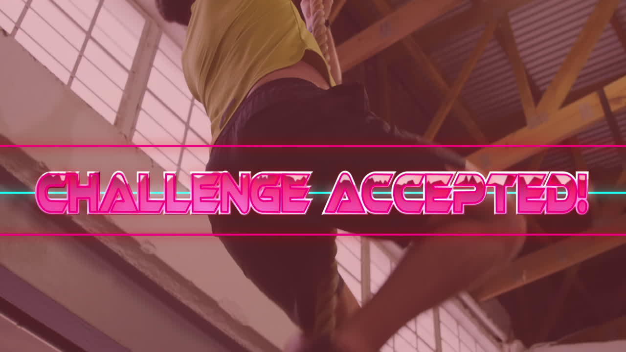 Animation of challenge accepted text over neon lines and caucasian man climbing rope