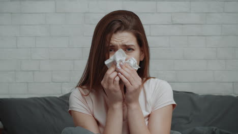 woman suffering from cold symptoms