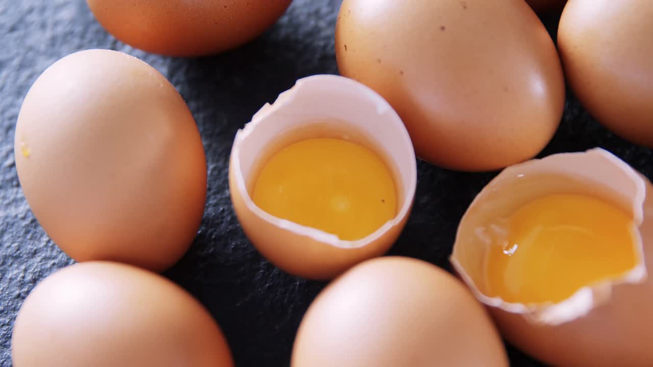 Eggs on black background 4k