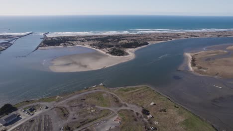 stunning 4k aerial tilt up bandon oregon coastal vista, beaches and sandbank