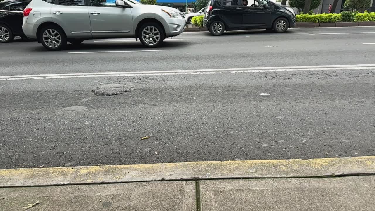Ground-level footage of traffic jams in Mexico City, slow motion