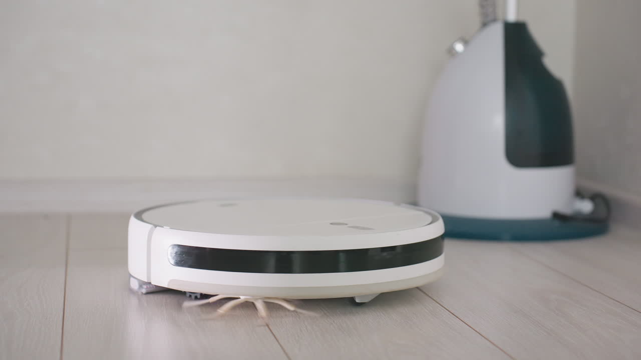 Robot vacuum cleaner operates smoothly on wooden floor, demonstrating efficiency of smart home cleaning technology, maintaining hygiene and convenience in modern household