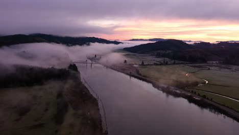 aerial view of south coos river and bridge at sunrise