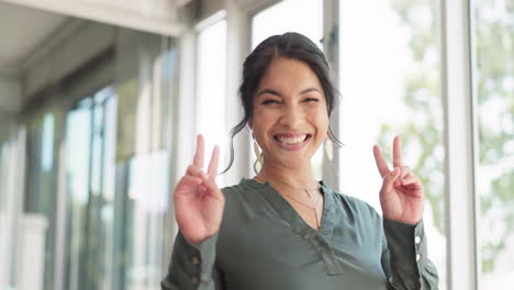 happy, face and business woman with a peace sign