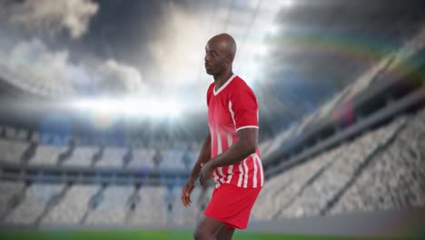 Animation-of-stadium-over-african-american-male-soccer-player