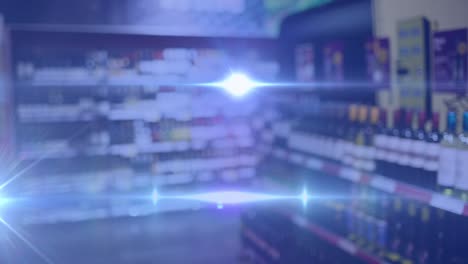 Animation-of-lights-over-blurred-alcohol-shop-in-blue