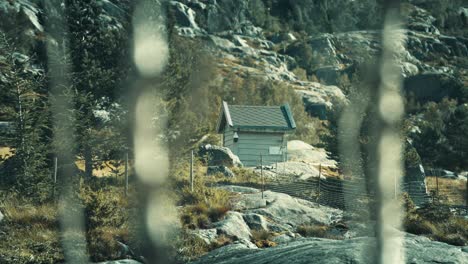 a tiny hut hidden in the mountains