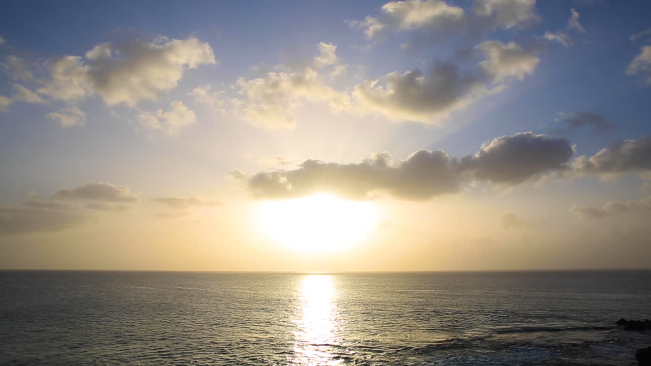 Beautiful sunset with clouds crossing the horizon.