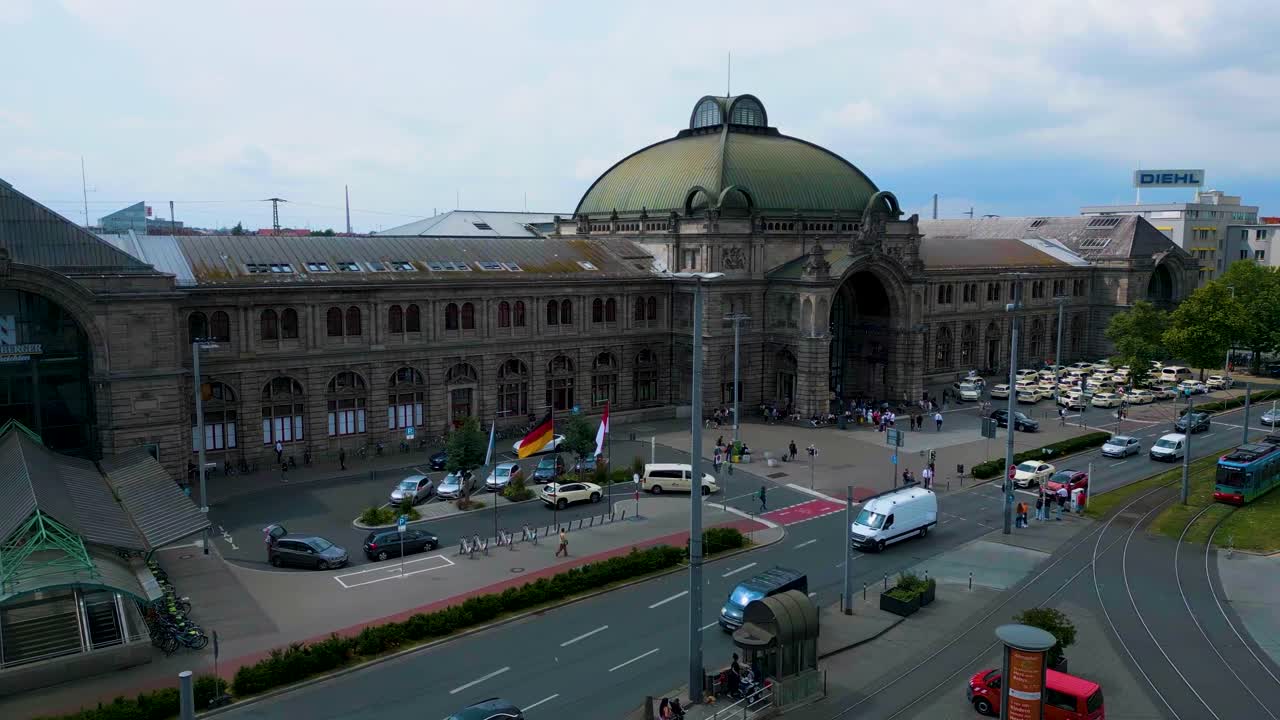 4K Aerial Drone Video of Auto Traffic in front of the Hauptbahnhof Train Station in Downtown Nurnberg, Germany