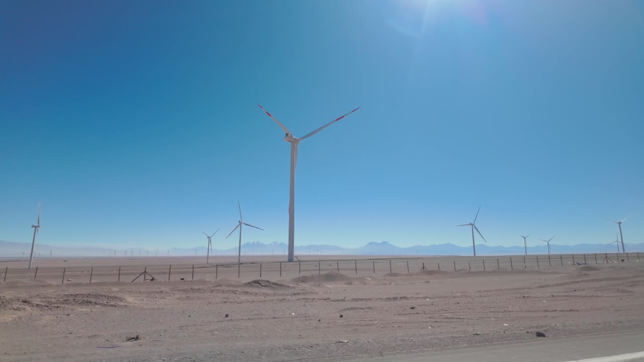 Wind turbines along highway in Desert