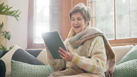 Home,-video-call-and-senior-woman-with-a-tablet