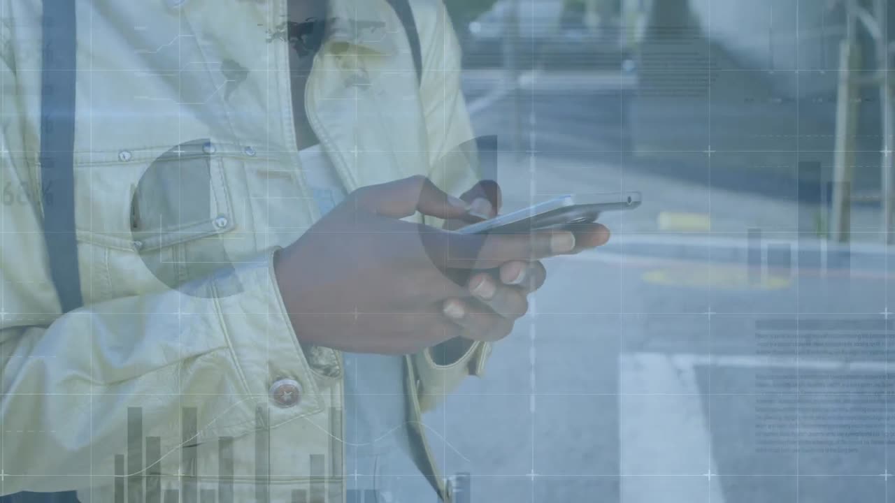 Animation of infographic interface over midsection of african american woman using cellphone