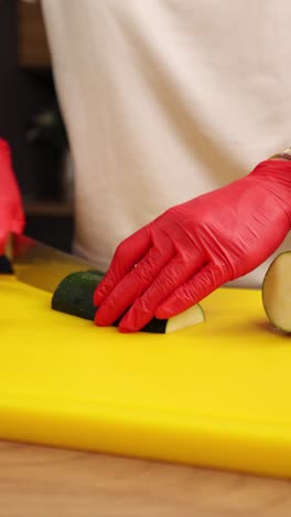 woman chopping zucchini