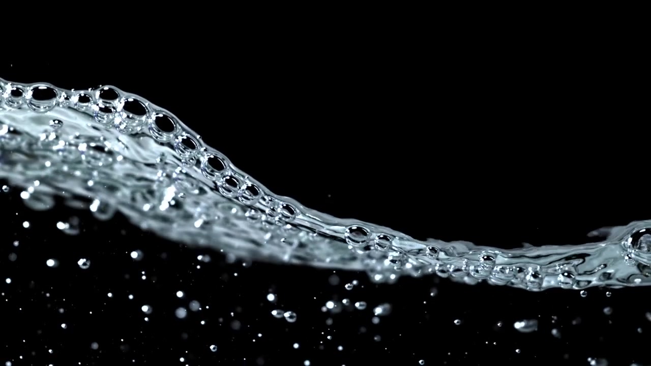 Dynamic Clear Water Surface with Rising Bubbles on Black Background