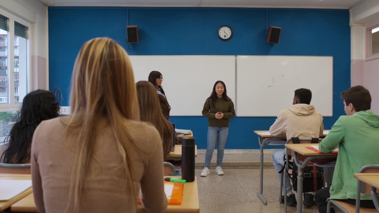 Classroom presentation with students and teacher