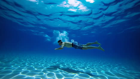 man swimming underwater