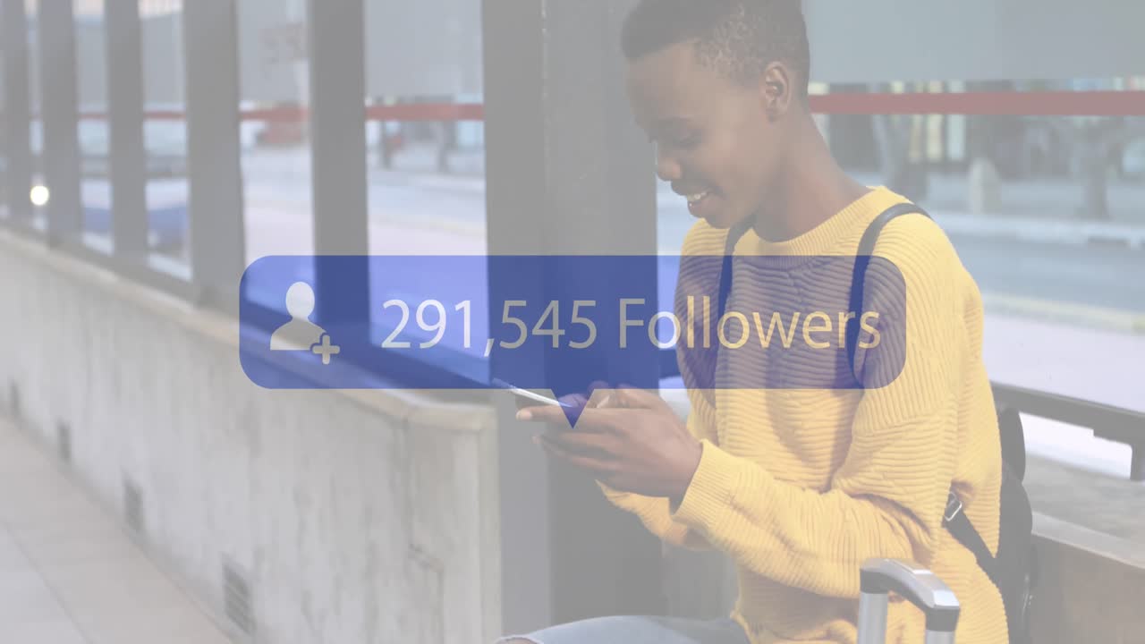 Animation of social media icons over african american woman using smartphone