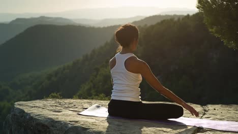 woman doing yoga outside 23