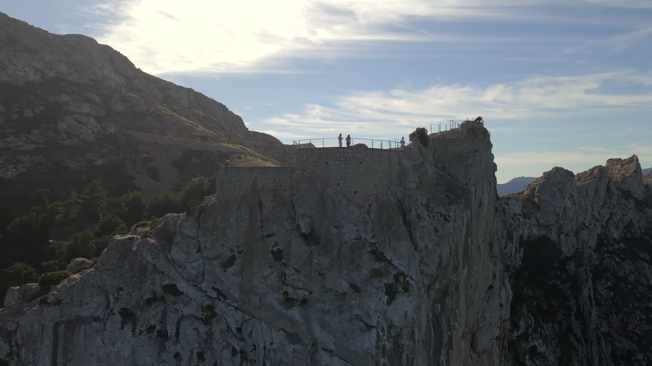 Experience breathtaking views from Mirador es Colomer in Pollensa as the sun sets over the cliffs. This captivating location offers a serene escape into nature’s beauty in Mallorca.