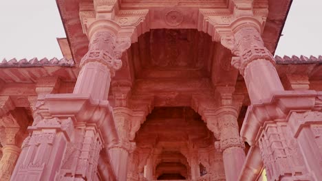 red stone ancient hindu temple architecture from unique angle at day