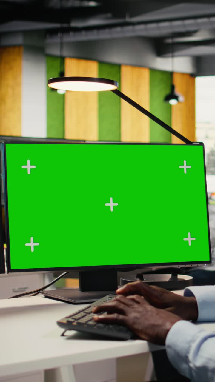 Vertical video Isolated screen PC used by admin in office, using AI specialized hardware