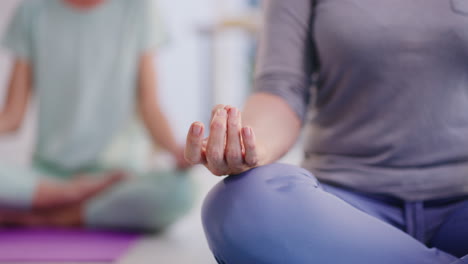 senior women practicing yoga