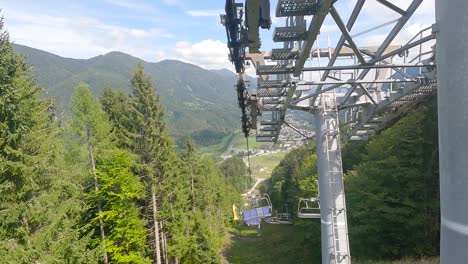 travelling on a ski lift in the julian alps in summer