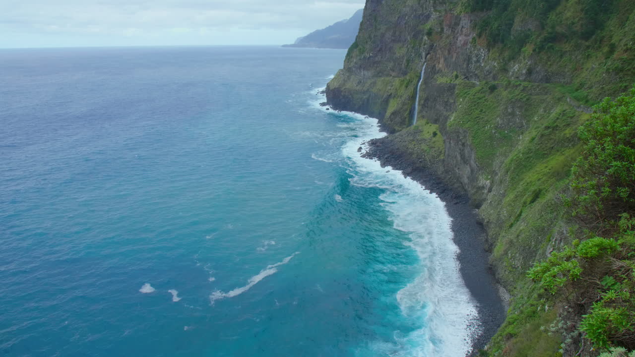 Miradouro do V&eacute;u da Noiva Madeira Coast line waterfall panorama mountain with waves sky ocean, beach